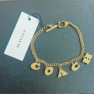 Coach Gold-Tone Crystal Letter Charm Chain Bracelet